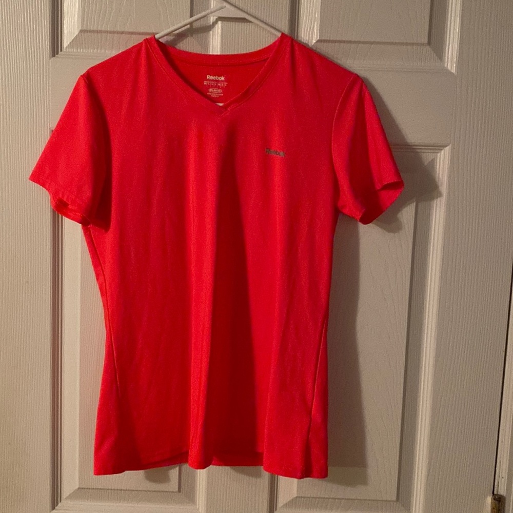 A Reebok play shirt size large in women. Great for working out
